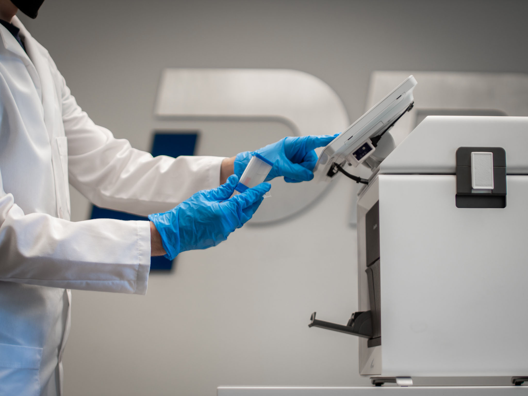 Pro Covid Testing technician using the Cepheid rapid PCR machine